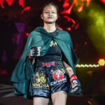 Supergirl walks toward the ring for her fight with Ekaterina Vandaryeva at ONE: HEAVY HITTERS